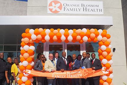 Orange Blossom Family Health Ribbon Cutting