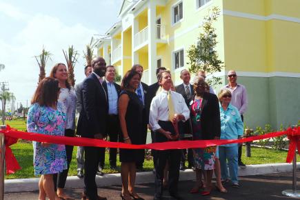 Ribbon cutting at Neighborhood Renaissance Mango Cove Apts, financed by Florida Community Loan Fund